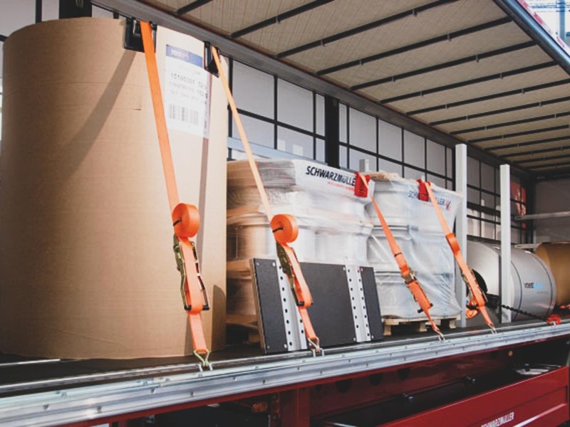 LoadLok straps securing a load on a Schwarzmuller curtainsider trailer